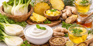 Alimenti che sgonfiano la pancia su tavolo di legno